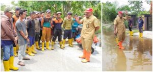 Atasi Banjir di Jalan Pel.Baru dan Nelayan DLH Kab.Rohil Turunkan Personil Tim Satgas banjir